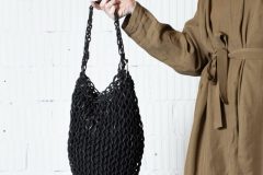 Knit_bag_roundbottom_leather_black_onmodel2-scaled